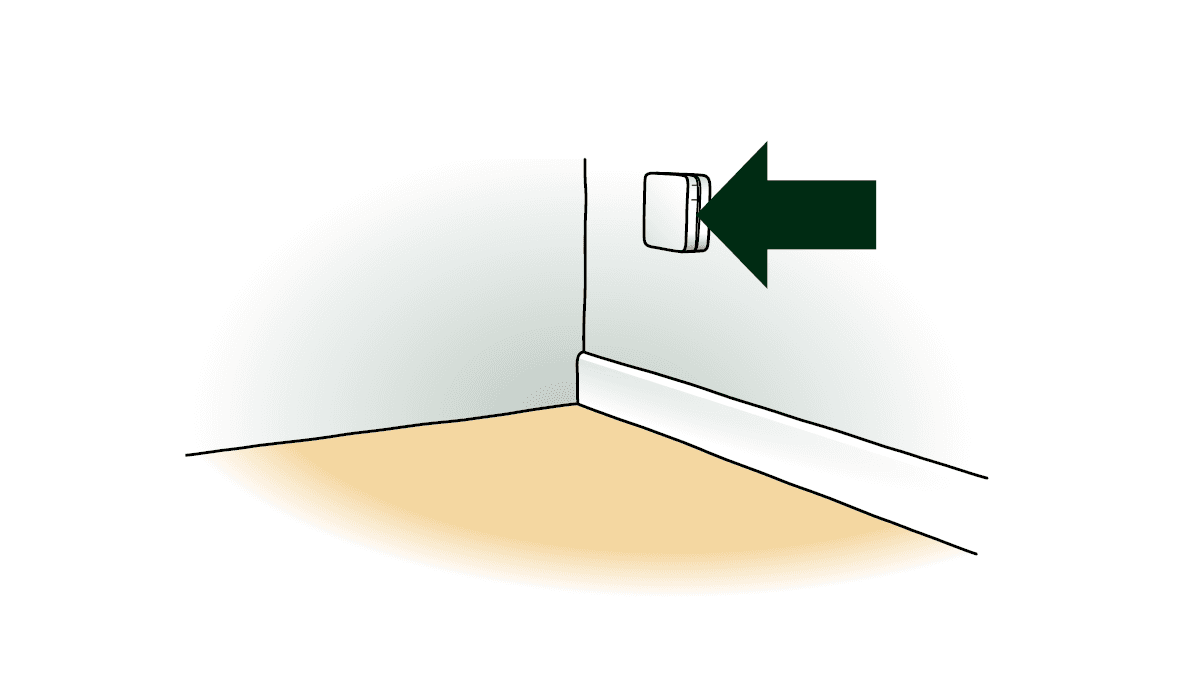 Illustration af fiberboks, der hænger nederst på en væg med en stor grøn pil, som peger på den.