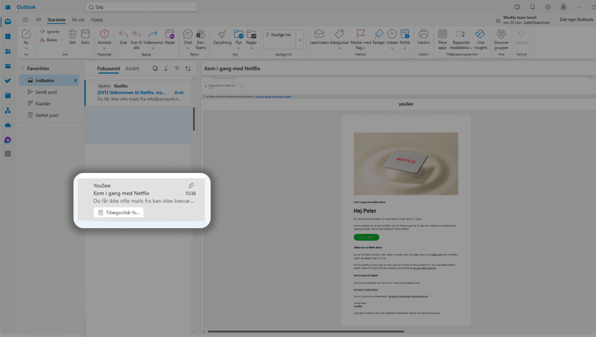 Outlook-mailboks med fokuseret indbakke og åben mail fra YouSee om kom i gang med Netflix