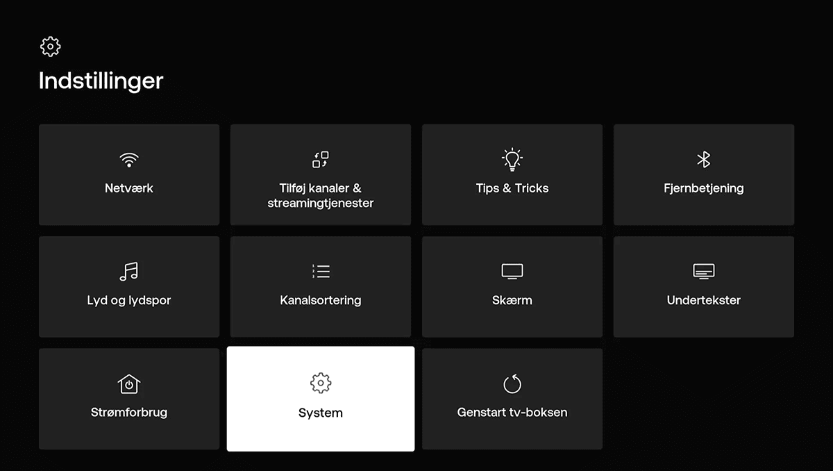 Indstillingsmenu med valgmuligheder for netværk, kanaler, lyd, skærm, system og genstart af tv-boksen