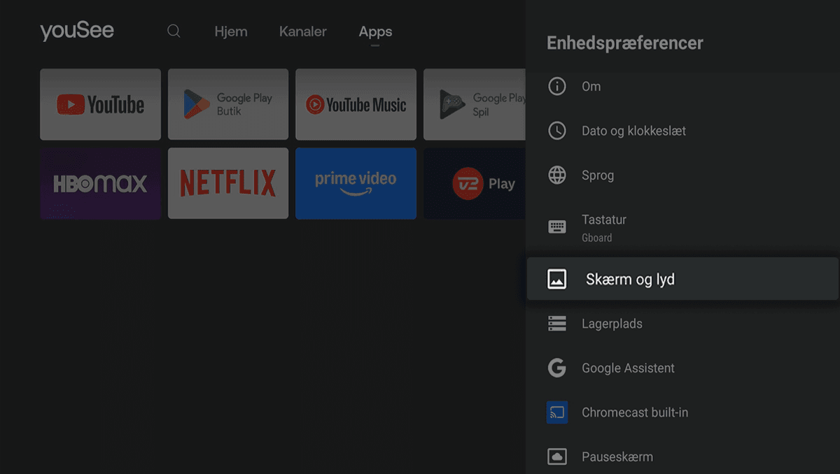 Mørk drop down-menu til højre med Enhedspræferencer åbnet, hvor Skærm og lyd er fremhævet og valgt.