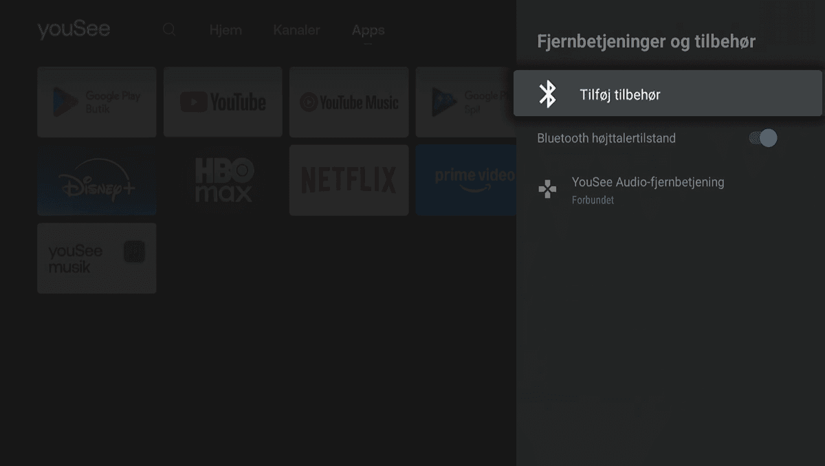 Mørk drop down menu til højre, hvor kategorien Tilføj tilbehør er fremhævet.