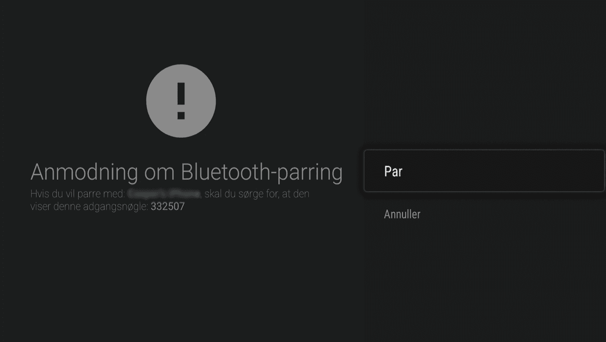Til venstre står der Anmodning om Bluetooth-parring. I en mørk drop down menu til højre er knappen Par fremhævet og valgt.